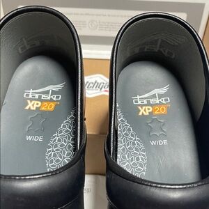 Dansko Men's Black Slip-On Loafers